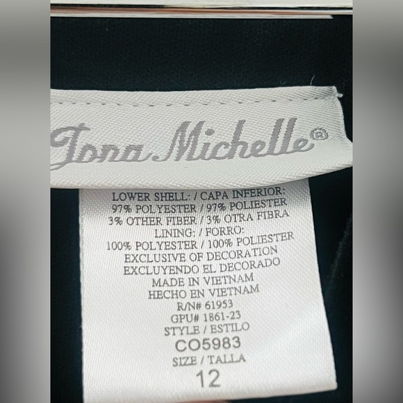 Jonathan Michelle dress size 12
17” across chest pit to pit loose on the waist - Picture 6 of 14